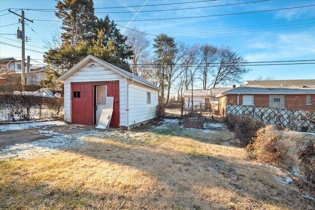 view of outdoor structure with a lawn