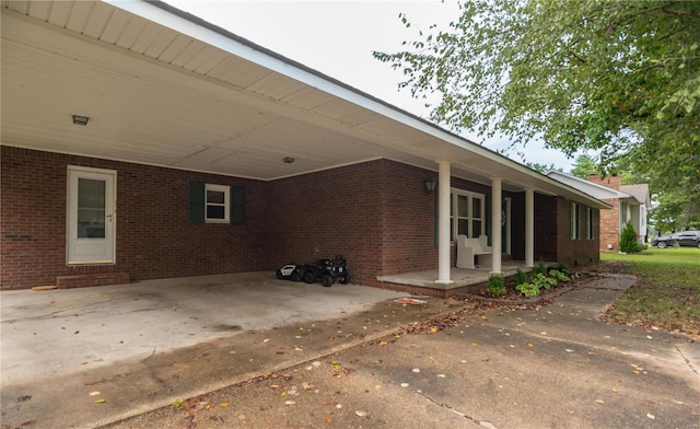 view of patio featuring a carport