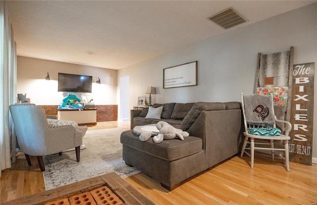 living room with hardwood / wood-style flooring