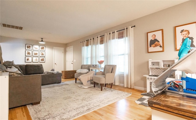 living area featuring hardwood / wood-style flooring