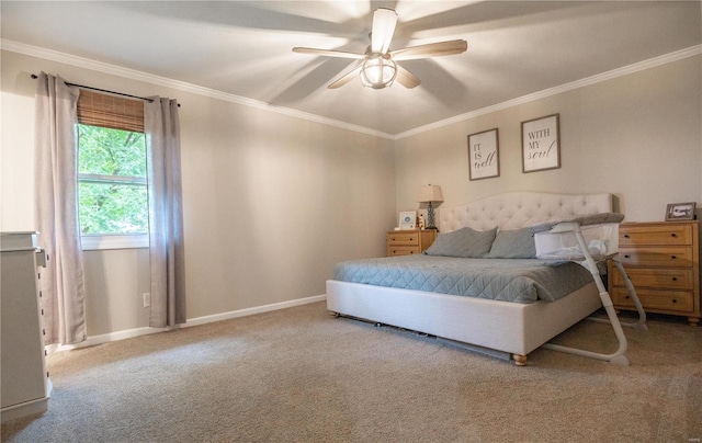 carpeted bedroom featuring ornamental molding and ceiling fan