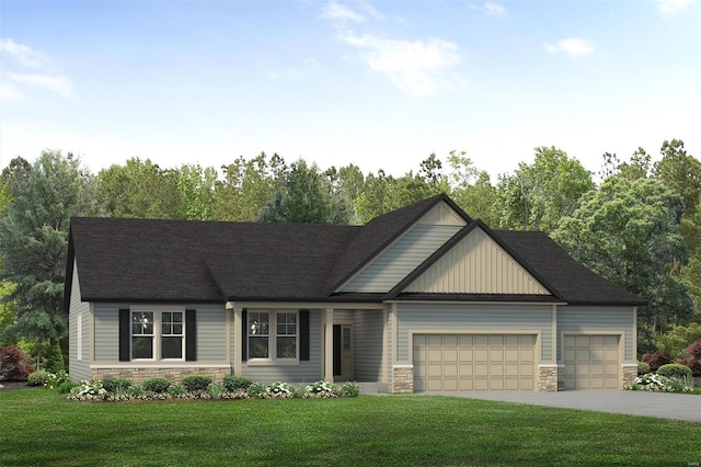 view of front of house with a garage and a front lawn