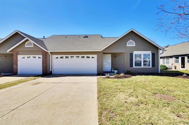 ranch-style home featuring brick siding, a shingled roof, concrete driveway, an attached garage, and a front lawn