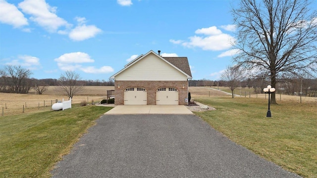 exterior space with aphalt driveway