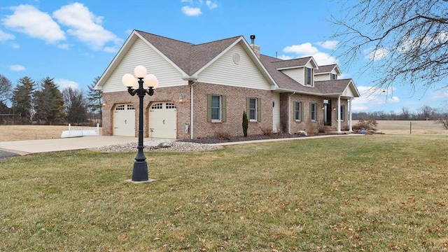 view of side of property with brick siding, an attached garage, a lawn, a chimney, and driveway