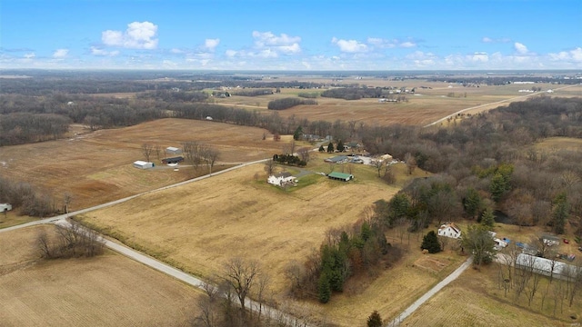 birds eye view of property with a rural view