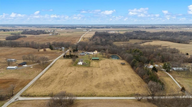 birds eye view of property featuring a rural view