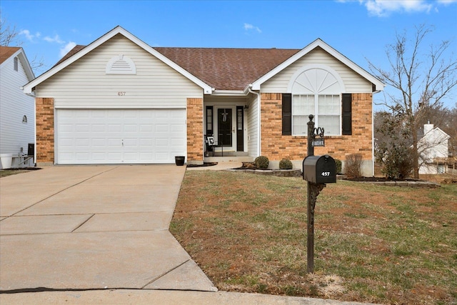 ranch-style home with brick siding, a shingled roof, an attached garage, a front yard, and driveway