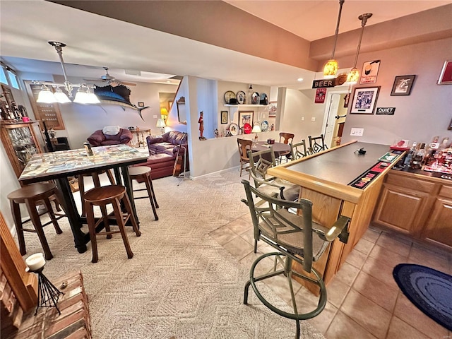 dining room with light tile patterned flooring