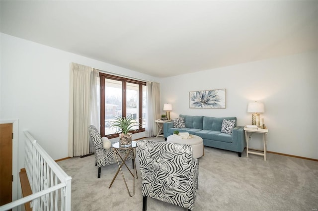 living room with baseboards and light carpet