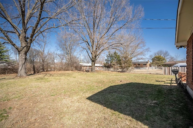 view of yard featuring fence