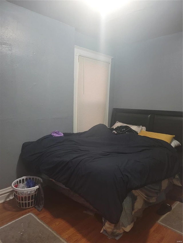 bedroom featuring hardwood / wood-style floors