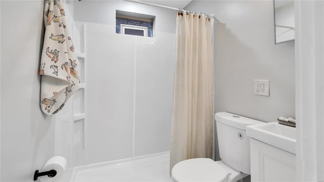 full bath with toilet and a shower with curtain