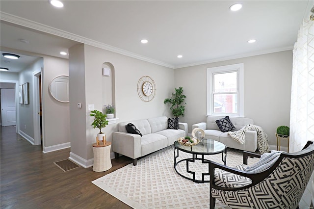 living area with recessed lighting, baseboards, wood finished floors, and ornamental molding