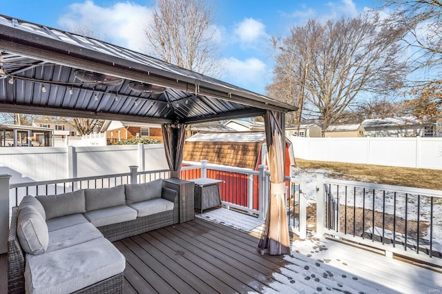 snow covered deck with a jacuzzi