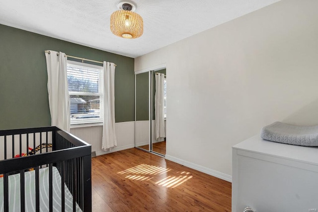 bedroom featuring wood-type flooring