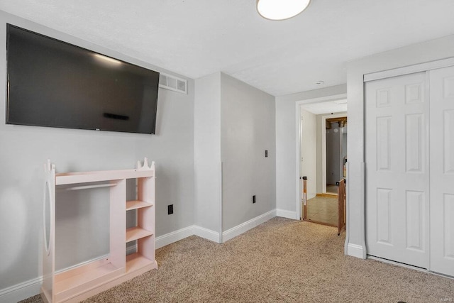 interior space with light colored carpet