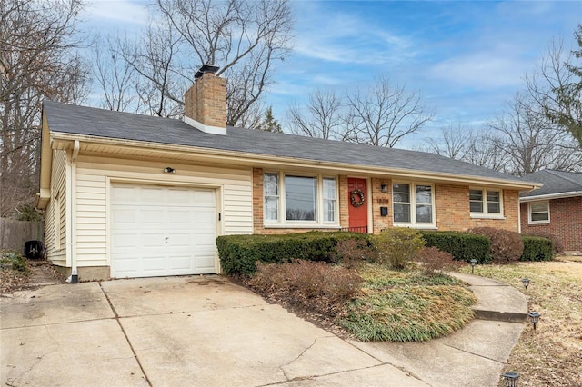 single story home with a garage