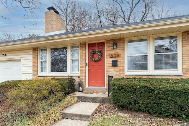 entrance to property with a garage