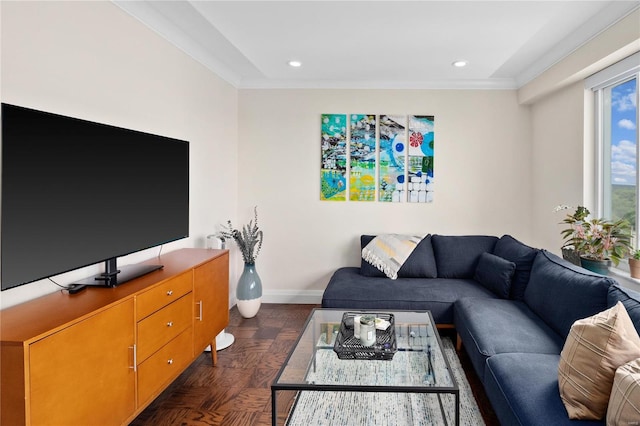 living room with baseboards, crown molding, and recessed lighting