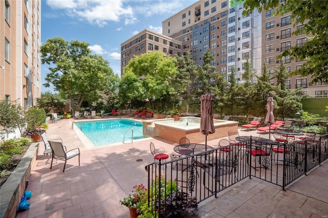 view of pool featuring a patio