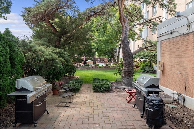 view of patio featuring a grill