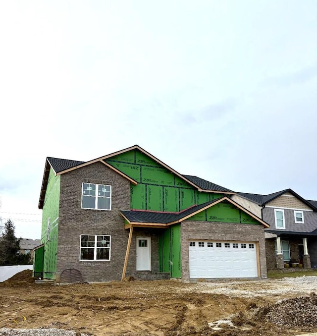 view of front of property with a garage