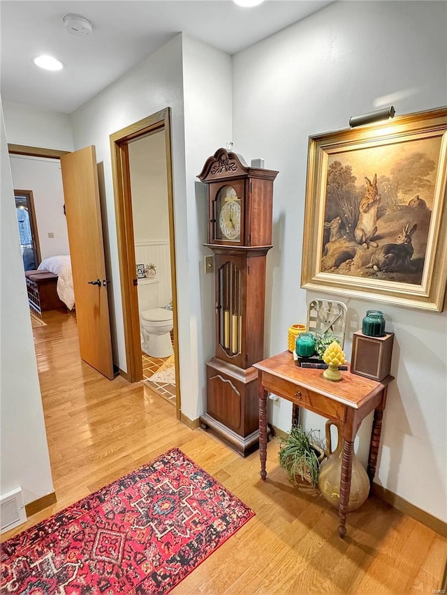 corridor featuring light hardwood / wood-style flooring