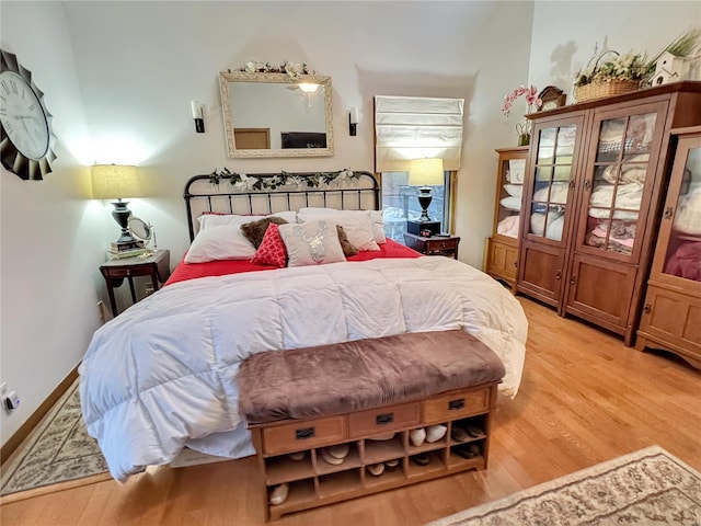 bedroom with light hardwood / wood-style floors