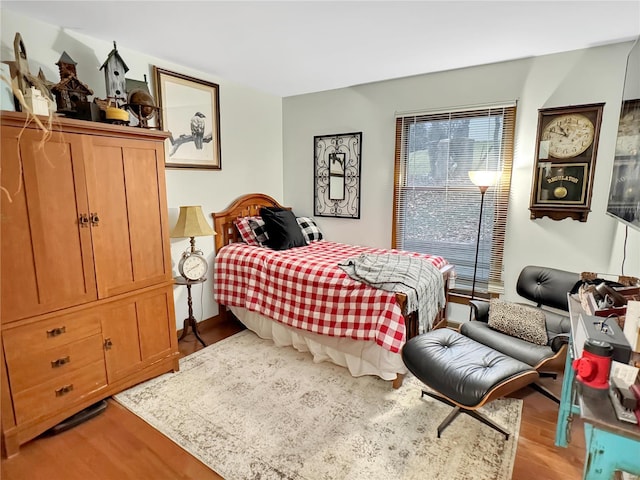 bedroom with light hardwood / wood-style floors