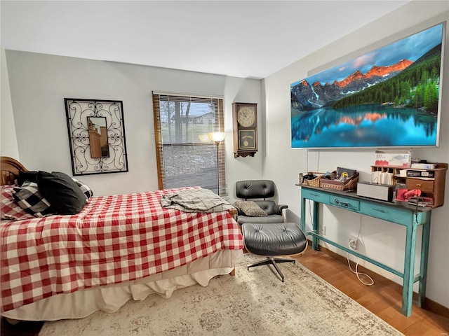 bedroom featuring hardwood / wood-style floors