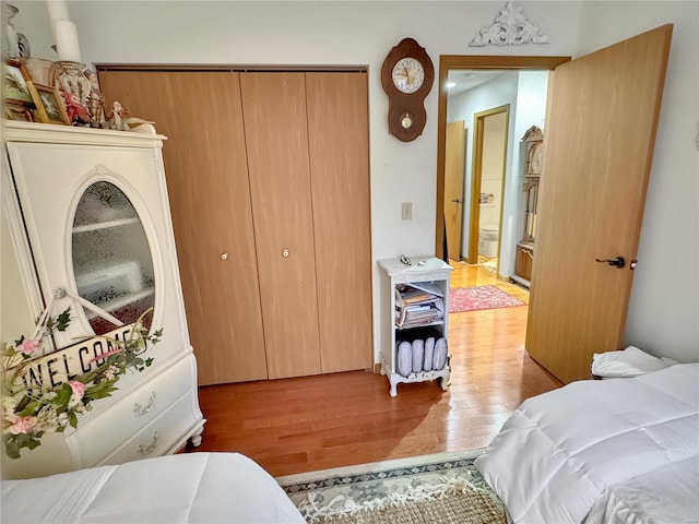 bedroom with light wood-type flooring