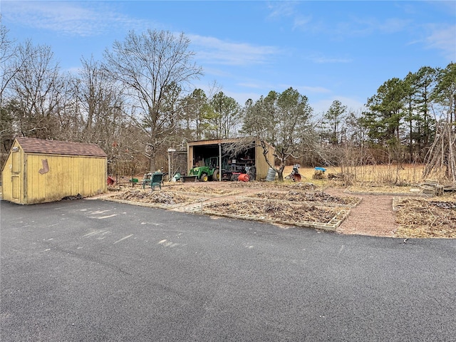 exterior space featuring a storage shed