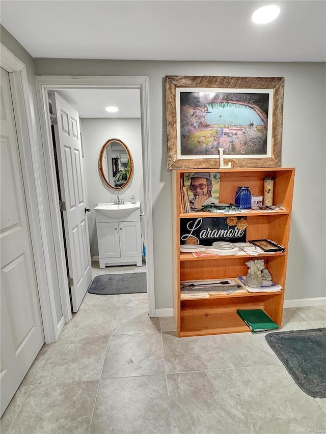 hallway featuring sink