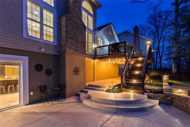 view of patio at twilight