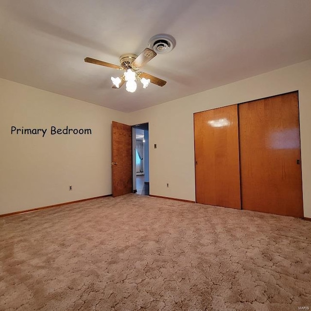 unfurnished bedroom with visible vents, light carpet, a ceiling fan, a closet, and baseboards