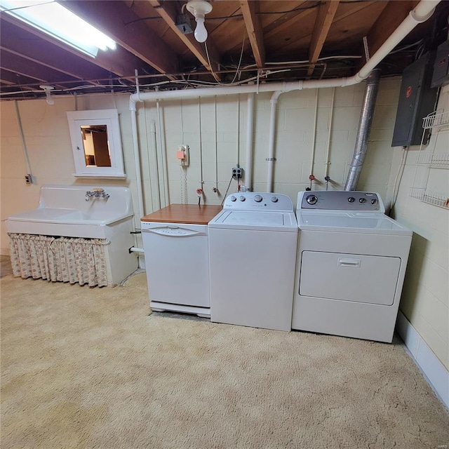 laundry area with electric panel, laundry area, and washer and dryer