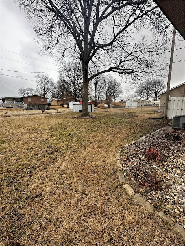 view of yard featuring central AC unit