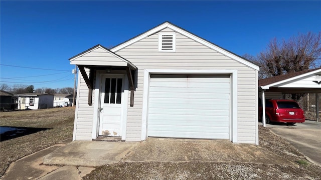 garage with a carport