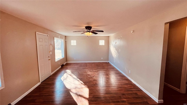 foyer featuring ceiling fan and dark hardwood / wood-style flooring