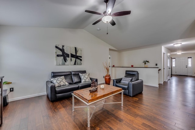 living room with ceiling fan, lofted ceiling, and dark hardwood / wood-style floors