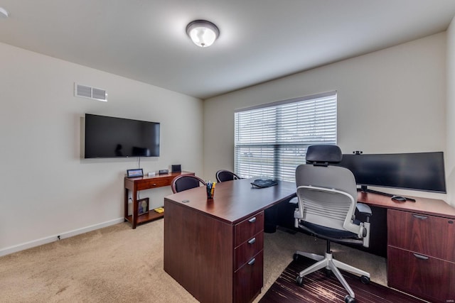 view of carpeted office space