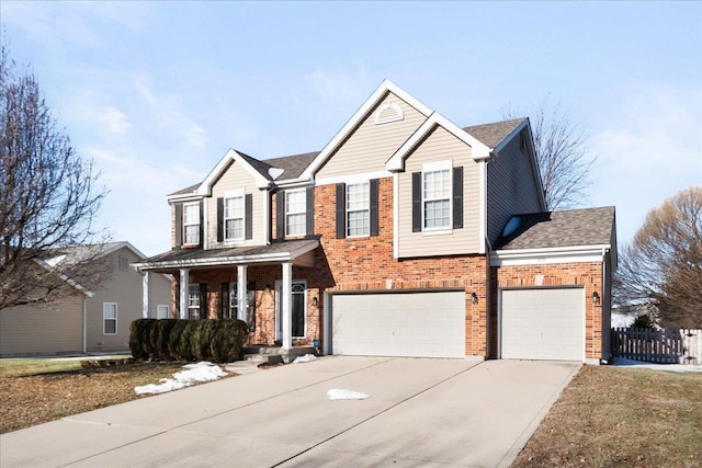 view of front of home featuring a garage and covered porch