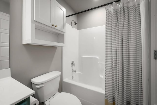 bathroom with vanity, toilet, and shower / bathtub combination with curtain