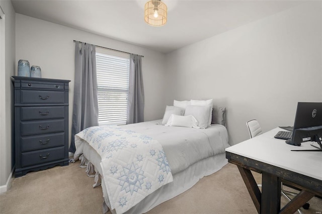 bedroom with light colored carpet