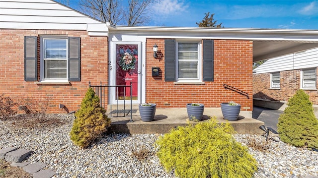 view of front of home featuring brick siding