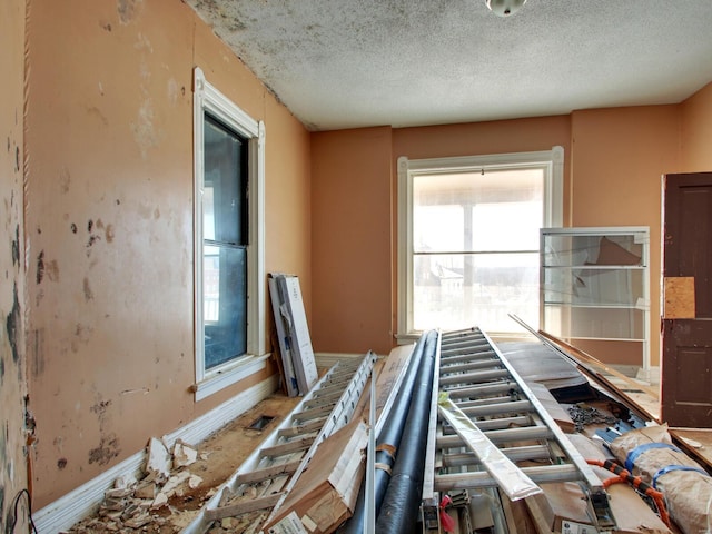 misc room with a textured ceiling