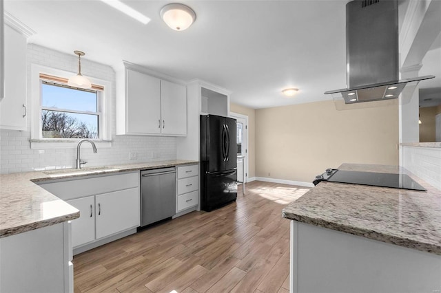 kitchen with black fridge, island exhaust hood, dishwasher, and white cabinets