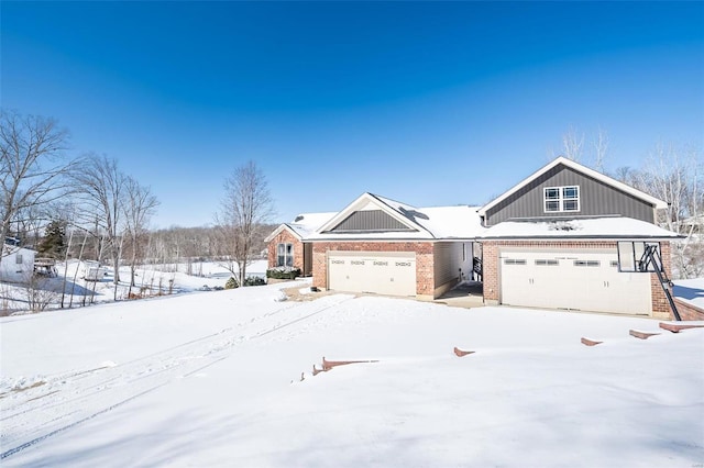 view of front of property featuring brick siding