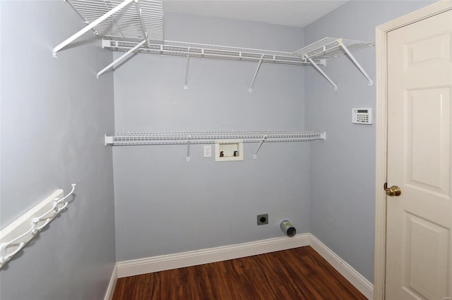 laundry room featuring laundry area, hookup for an electric dryer, baseboards, and washer hookup